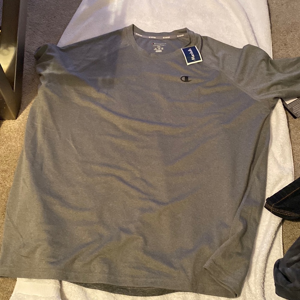 Selling a a grey performance shirt from Champipn, never worn ever!!